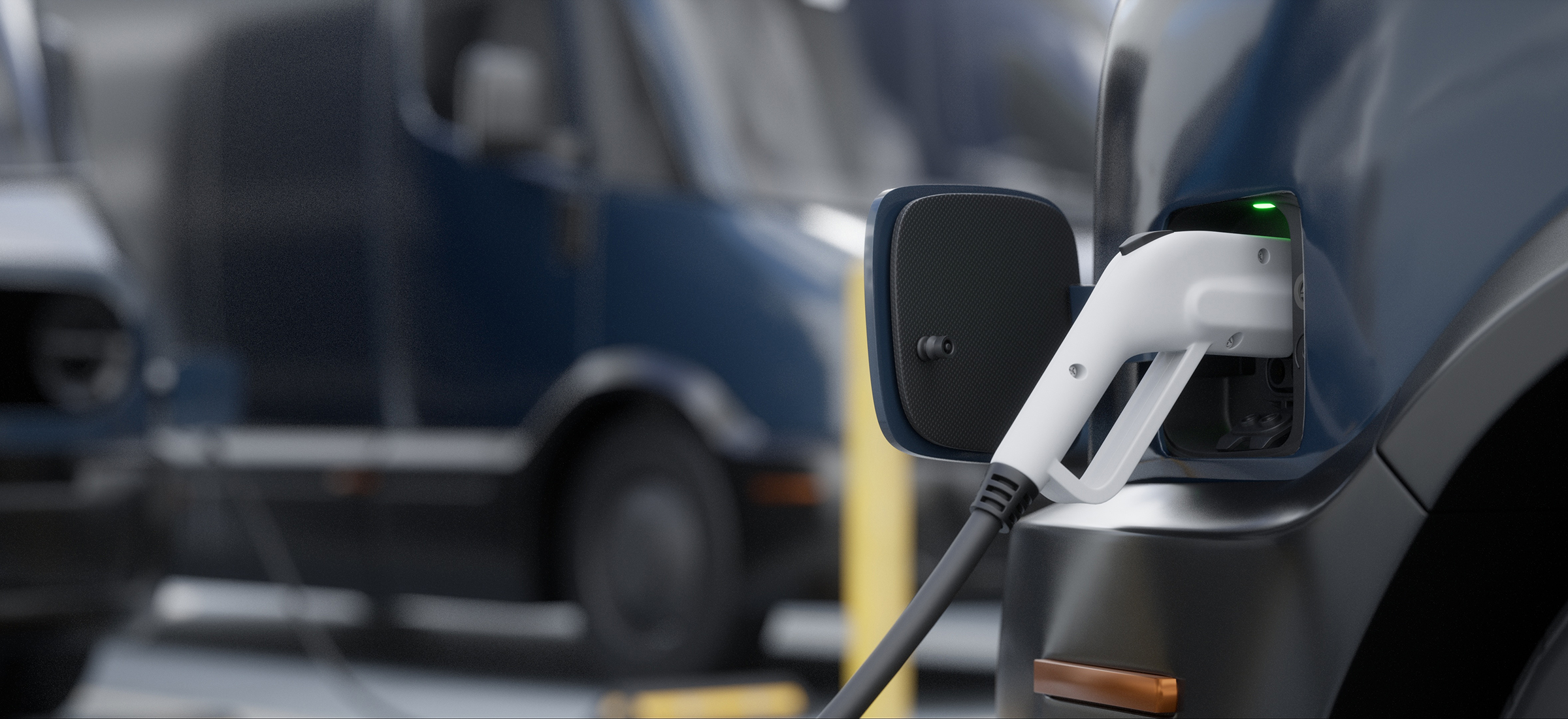 E-Fahrzeug wird geladen - Symbolbild für emissionsfreie Mobilität bei Stahlberg Ladekabel in der Ladebuchse eines E-Fahrzeugs als Symbolbild für die schrittweise Umstellung auf E-Mobilität bei Stahlberg
